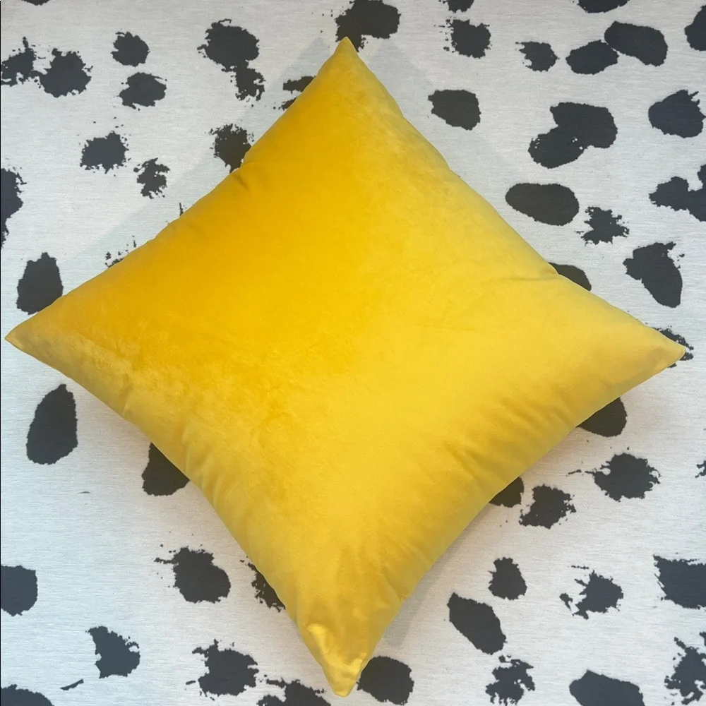Yellow velvet throw pillow
